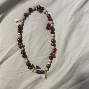 Elegant Beaded Bracelet with Tassels